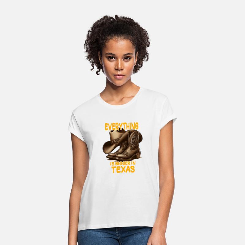 big cowboy shoes and hat